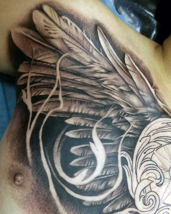 tatuaggio ali sul petto 09